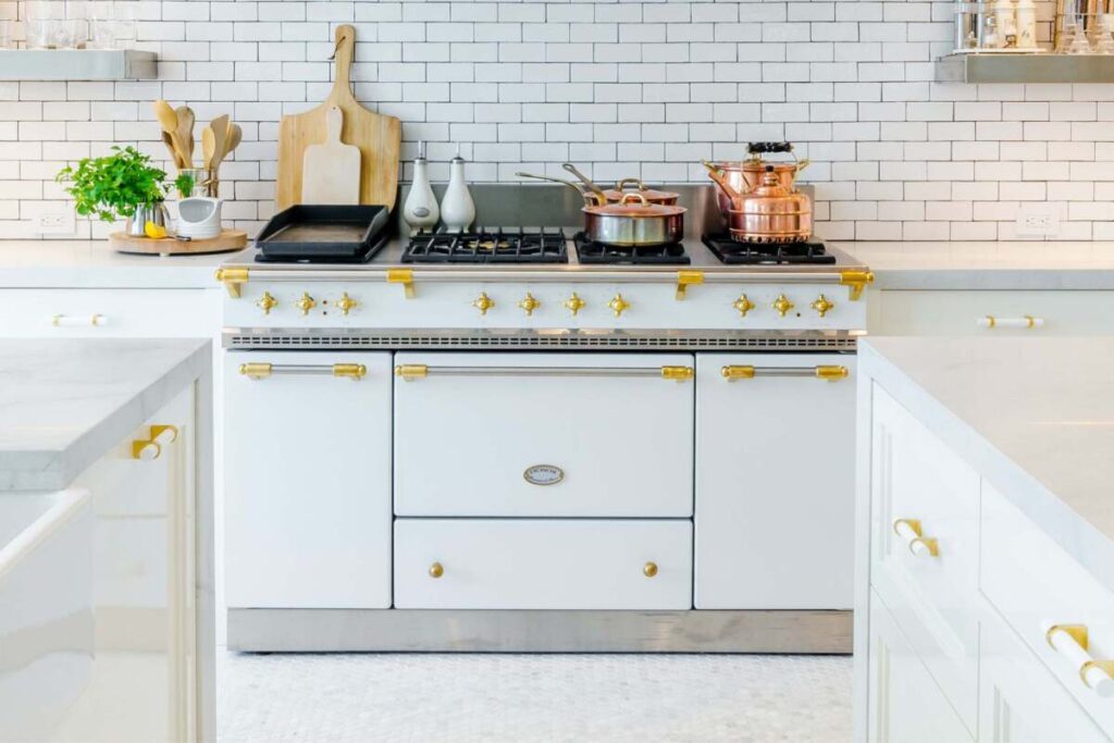 A high-end oven range in white and gold