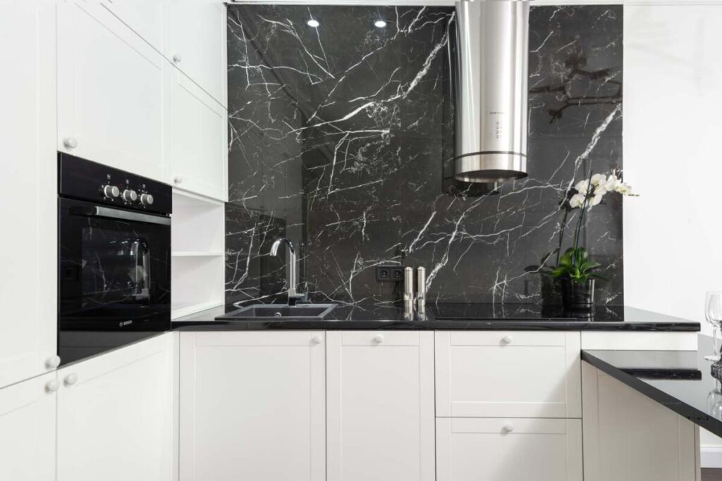 Black marble kitchen backsplash