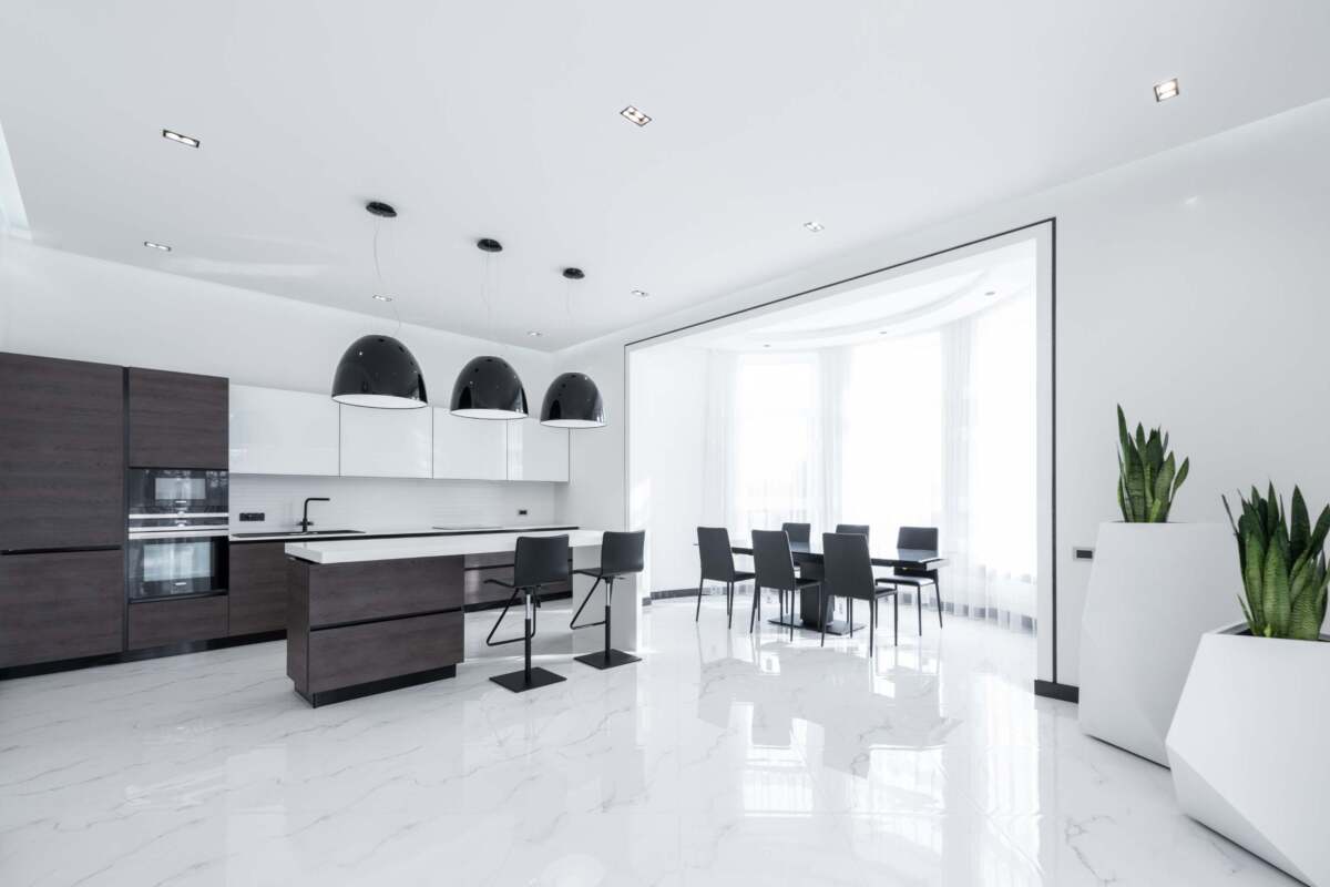 White kitchen with marble floors