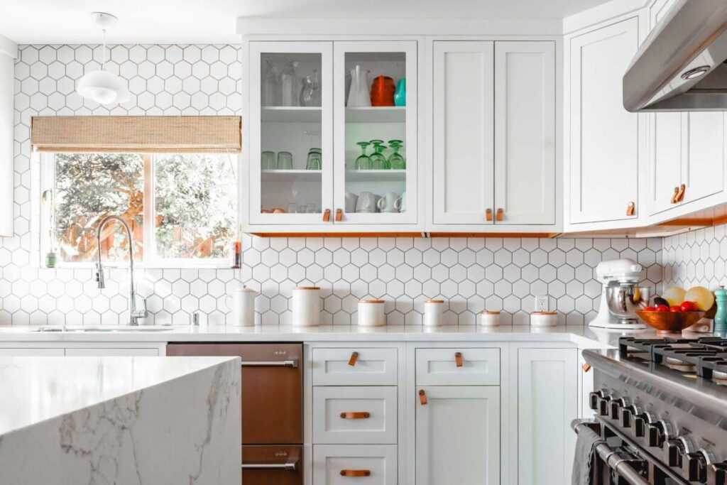 white tiled kitchen backsplash