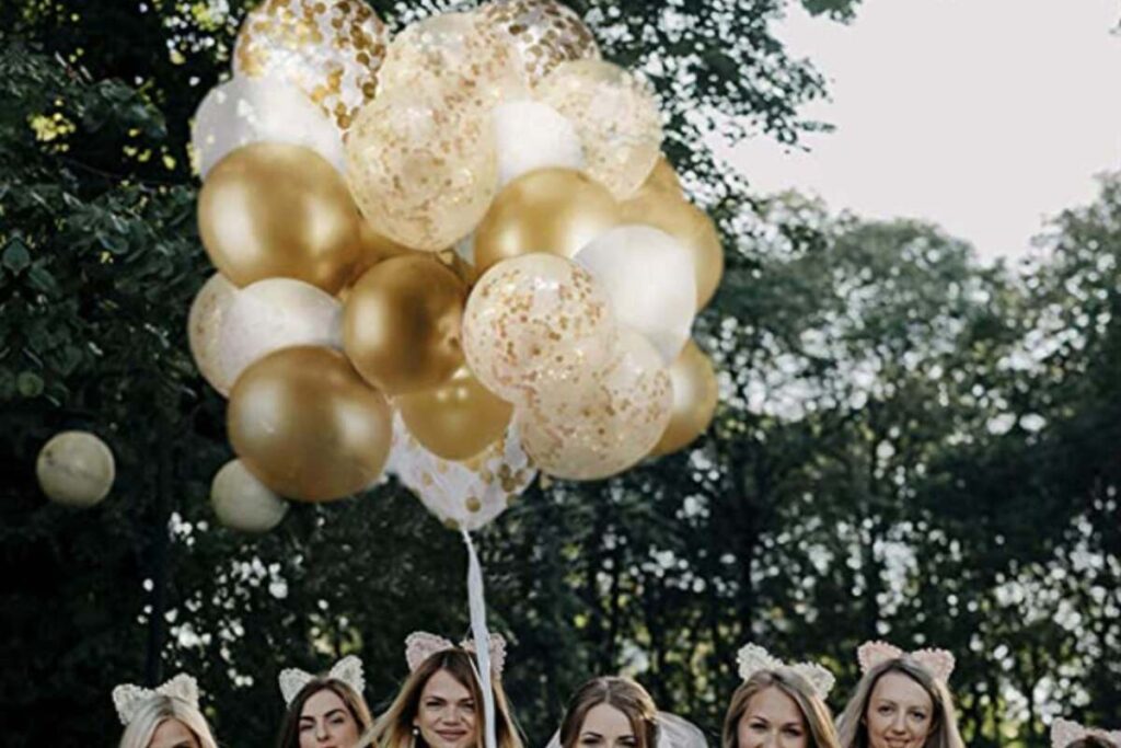 Gold and white confetti balloons