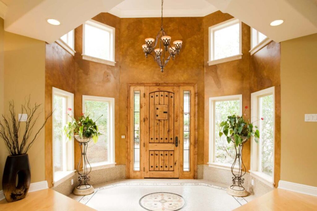 large foyer with chandelier