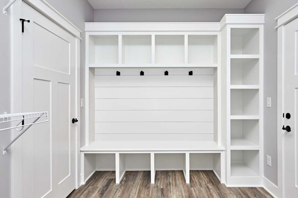 white shelving unit in an entryway
