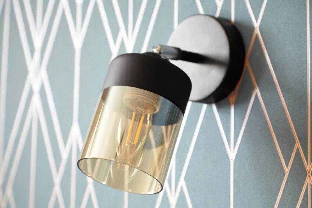 a black wall sconce