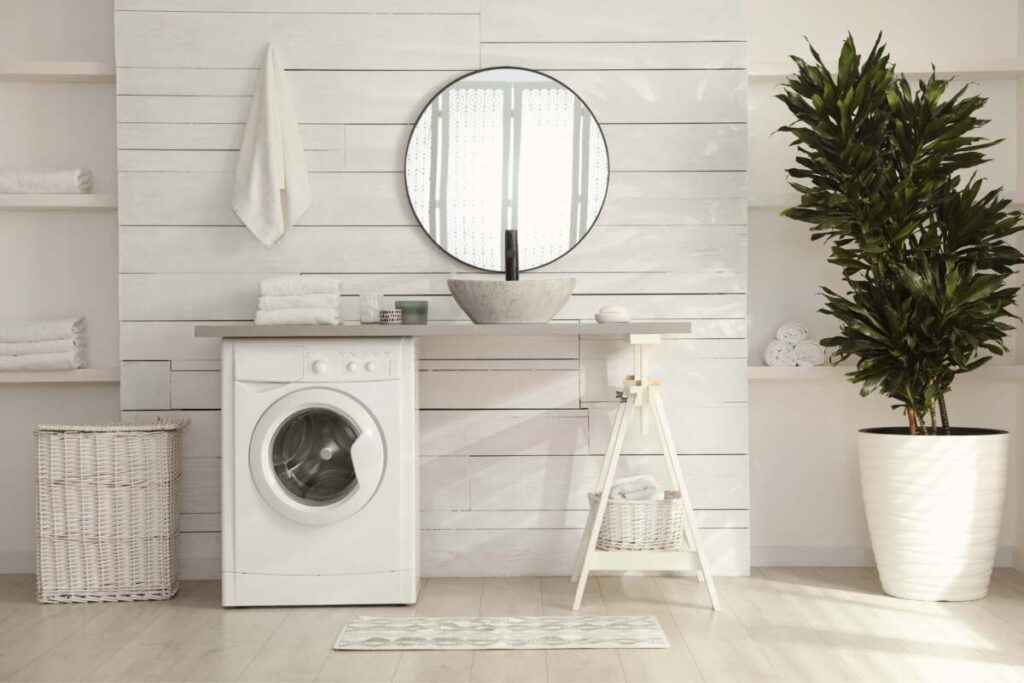 laundry room with a white wooden backsplash