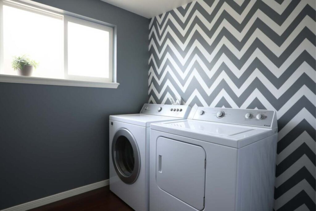 Laundry room with chevron wallpaper